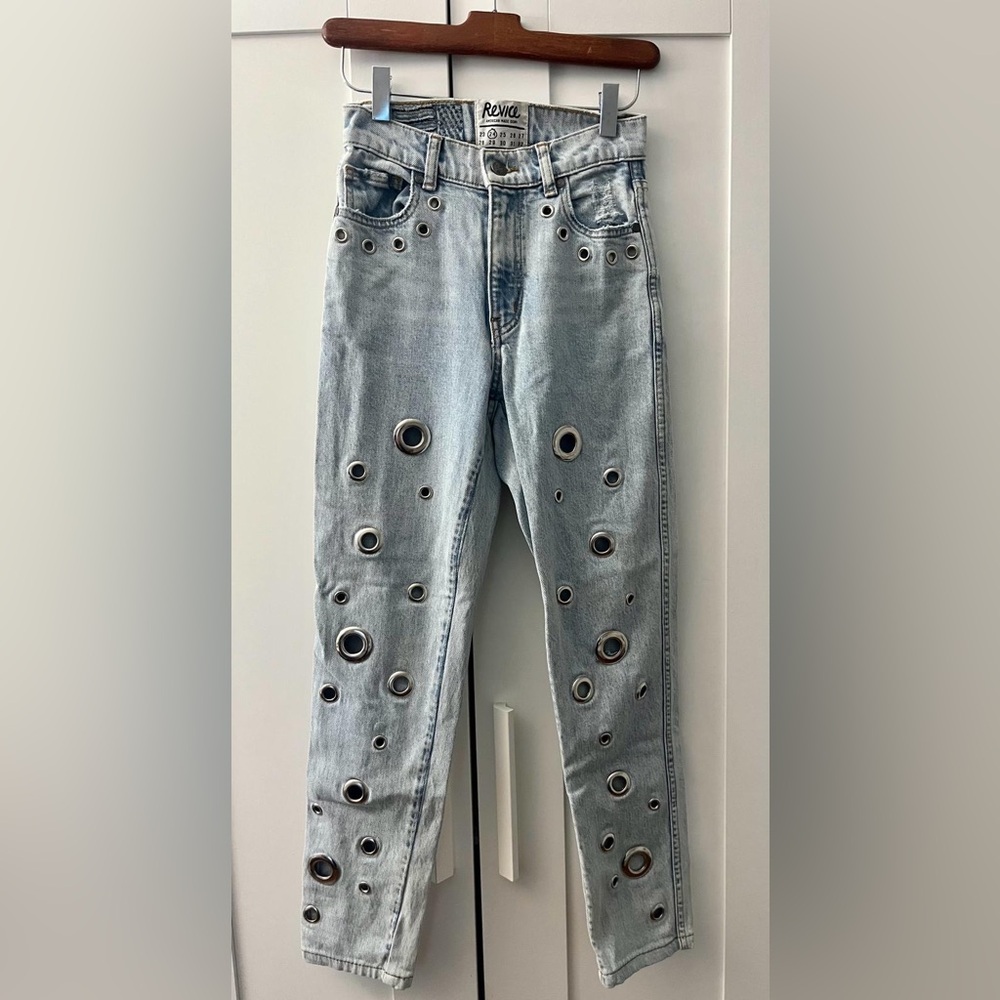 Revice jeans with metal detail cutouts